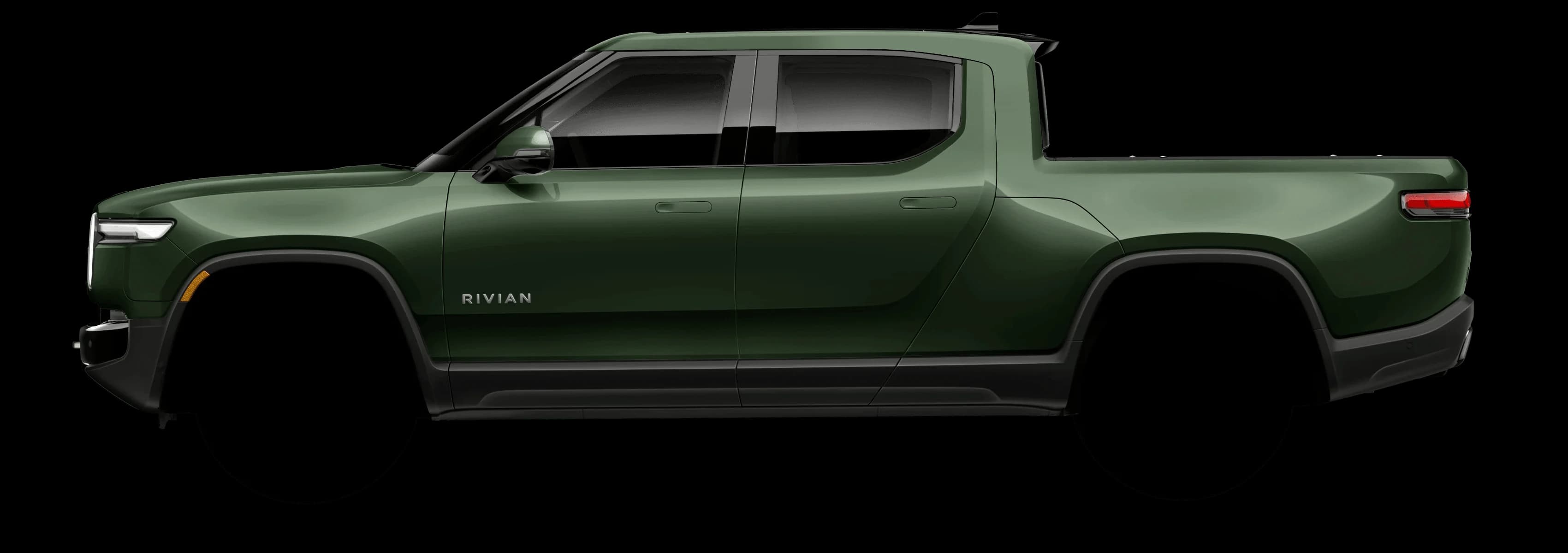 Side profile of a green Rivian R1T pickup